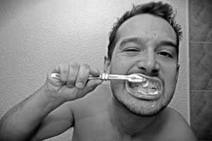 Autoportrait. brushing teeth with oxygenated toothpaste