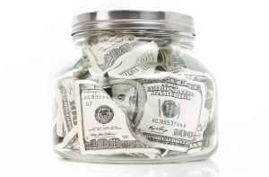 Money in a jar (How much does it cost to get your teeth whitened?; This much)